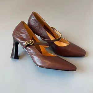 Elegant dark brown leather Mary Jane high heels featuring square toe and flared block heel