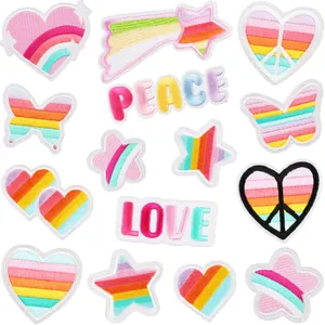 Set of colorful rainbow embroidered patches featuring heart star butterfly peace and love