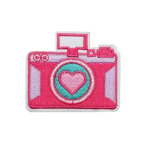 Cute pink camera embroidered patch with heart detail for girls' clothing DIY projects