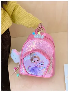 Detail of pink sequin children's backpack featuring cartoon princess and unicorn motif