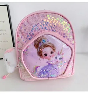 Close-up of pink sequin children's backpack featuring a cartoon princess and unicorn.