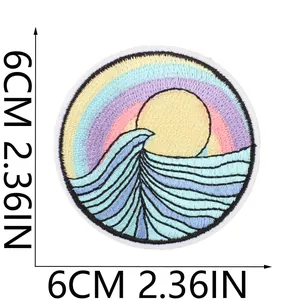 Close-up of circular embroidered wave patch showing 6cm x 6cm product dimensions.