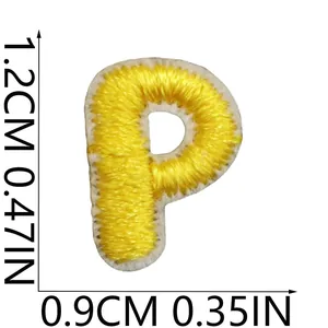 Macro view of mini yellow embroidered letter P patch with clear size dimensions