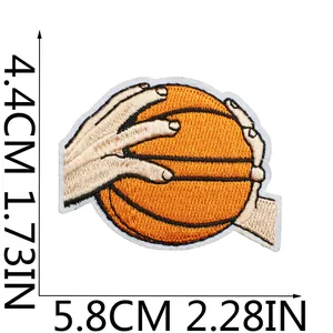 Detailed macro view of the basketball embroidered patch showing dimensions in CM and IN units