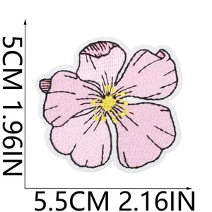 Detailed view of the pink flower embroidery patch showing 5.5cm width dimensions