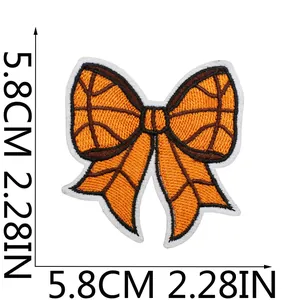Detailed view of basketball themed bow embroidered patch with 5.8cm dimensions