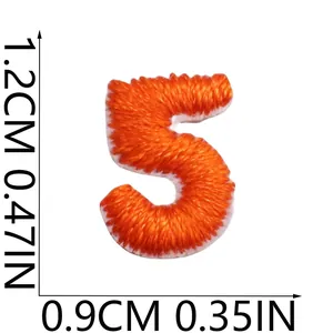 Detailed view of a mini orange number 5 embroidered patch for DIY craft projects