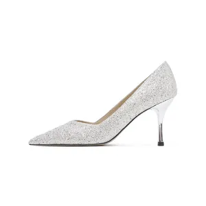 Side view of elegant silver glitter high heel pump with pointed toe and stiletto heel