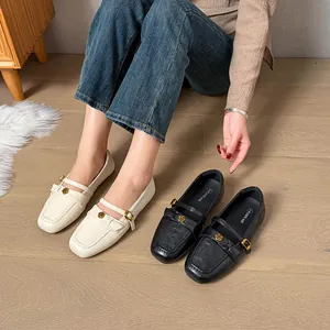Detailed view of large size Mary Jane loafers with elegant rose buckle decorations