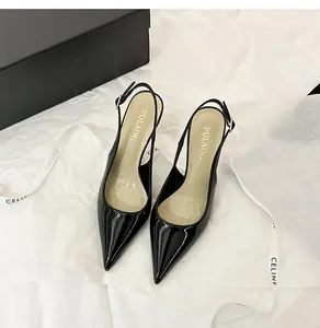 Elegant black patent leather slingback high heels featuring a sharp pointed toe design