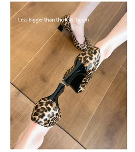 Detailed view of stylish leopard print square toe pumps with comfortable block heels