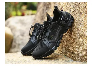 Professional black outdoor wading shoes featuring breathable mesh and anti-slip sole