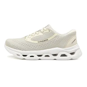 Side detail of men's breathable mesh sports shoe in beige with a thick chunky sole