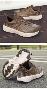 Close-up detail of brown breathable running shoes featuring a thick durable white sole