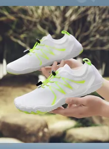 Breathable outdoor wading shoes featuring quick-dry mesh and vibrant neon green accents