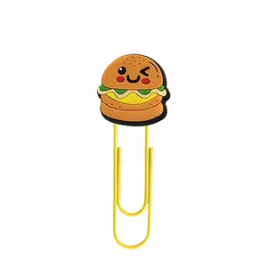 Detail view of a cute cartoon burger paperclip used as a creative bookmark for office