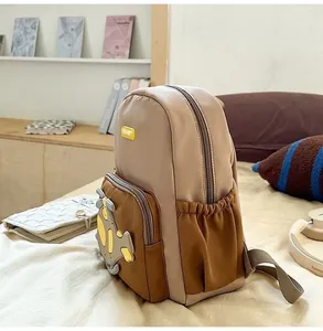 Close-up side view of a lightweight cartoon airplane school bag for kindergarten kids