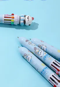 Macro detail of the cute cartoon sea otter prints and 3D topper on multi-color ballpoint pens