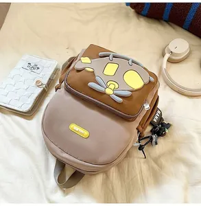 Close-up view of the cute 3D cartoon helicopter design on this lightweight toddler backpack.