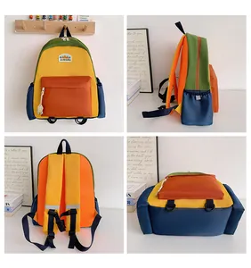 Vista multi-angolo di uno zaino colorato e leggero per bambini delle elementari