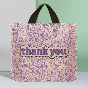 Detailansicht der floral bedruckten Einkaufstasche aus Kunststoff mit Thank You Text