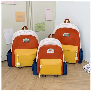 Set di tre zaini scolastici leggeri a blocchi di colore dopamina per bambini