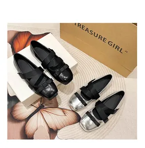 Square-toe Mary Jane flats in black and silver with cross straps and bow detail