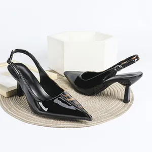 Elegant black patent leather slingback heels featuring stylish leopard print pointed toe