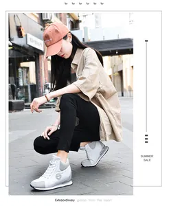 Stylish women's high-top wedge canvas sneakers featuring a trendy streetwear look