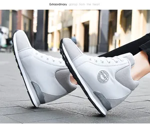 Detailed side view of women's grey high-top canvas sneakers with hidden wedge heels