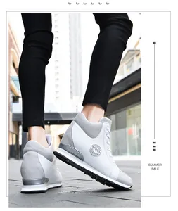 Detail shot of stylish white and grey women's hidden wedge canvas sneakers