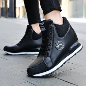 Stylish black women's high-top sneakers with a hidden wedge heel and sporty design