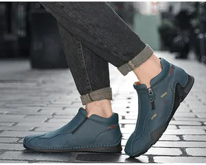 Blue leather high-top shoes for men featuring side zipper and sporty design