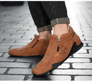 Men's brown leather high-top sneakers featuring a side zipper and stylish textured design