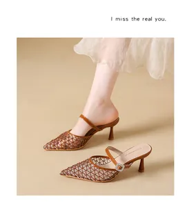 Macro view showing the intricate mesh detail and elegant high heel of these brown mules.