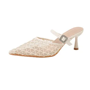 Elegant cream mesh pointed-toe mules with rhinestone buckle and kitten heels