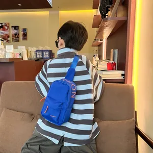 Blue canvas crossbody chest bag for boys with sporty fashion letter print design