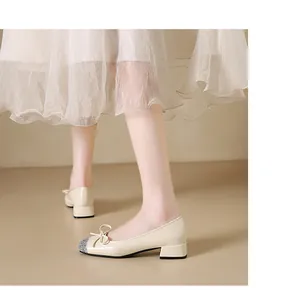 Elegant French style cream ballet flats with glitter silver toe and bow detail