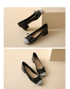 Close-up of black Mary Jane shoes featuring silver glitter toe cap and elegant bow.