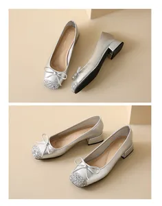 Detailed macro view of elegant silver Mary Jane shoes with sequin toe and bow accent
