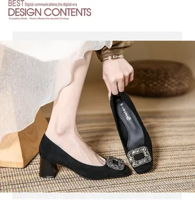 Detail of French black suede square toe pumps with luxury rhinestone buckle detail