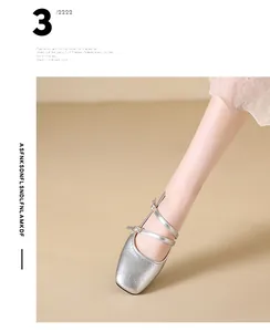 Detailed view of silver crackled leather square toe Mary Jane shoes with double straps