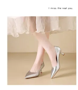 Elegant silver pointed-toe kitten heel pumps perfect for office and formal wear outfits.