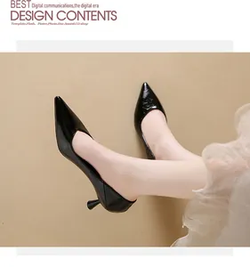 Detailed side view of black pointed-toe kitten heel pumps for office wear