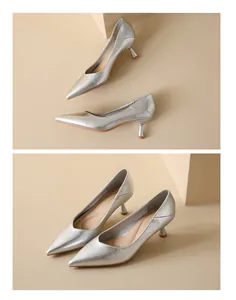 Detailed view of silver pointed-toe high heels with soft metallic leather