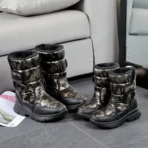Kids' waterproof camouflage snow boots with thick faux fur lining for winter travel