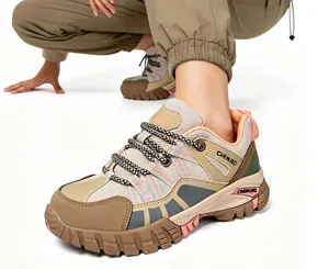 Detailed view of women's safety shoe featuring breathable mesh and reinforced chunky sole