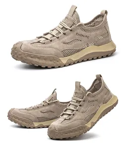 Vue détaillée de chaussures de sécurité kaki respirantes avec empiècements mesh.