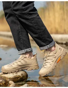 Detail view of breathable men's safety work shoes with steel toe in an outdoor setting