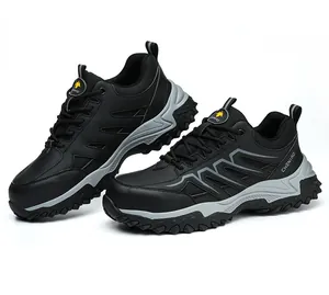 Close-up of black breathable safety shoes with reinforced steel toe and rugged sole